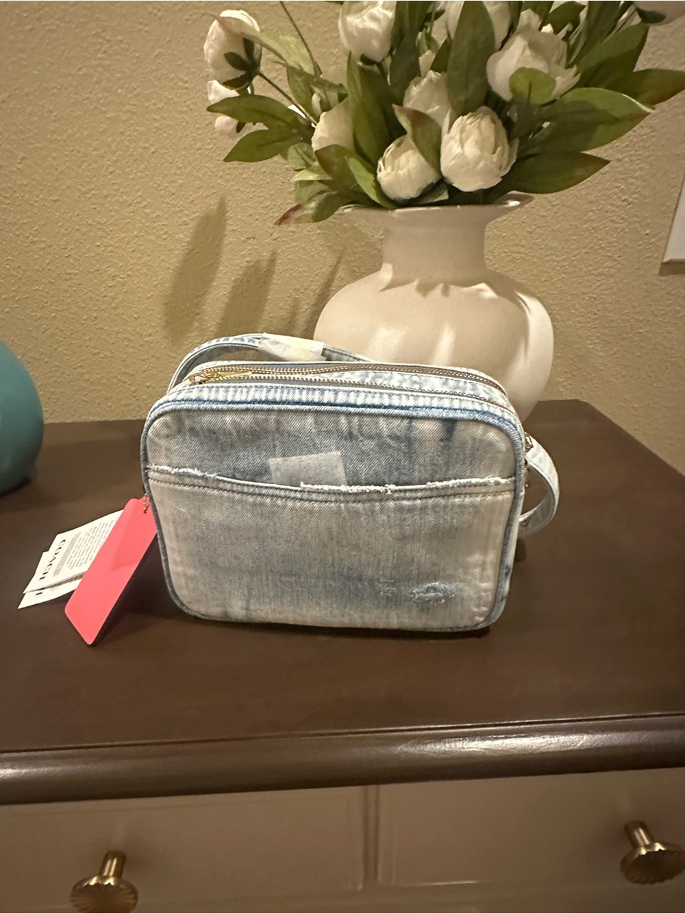 Carey Crossbody Bag
In Loved Denim With Charms
NWT